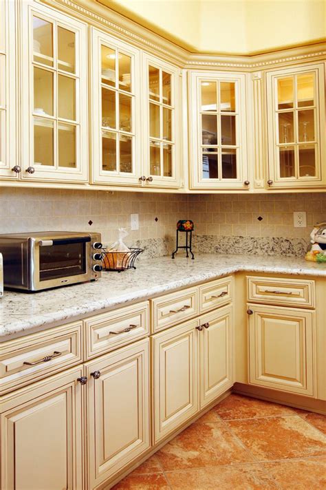 Do you have glass panel upper kitchen cabinets? North American Maple Antique White Glaze Kitchen Cabinets ...