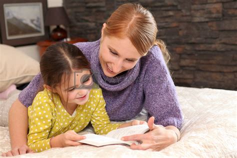 Mother Teaching Daughter To Read By Phovoir Vectors And Illustrations