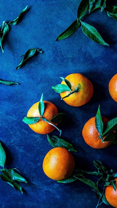 Download Orange Fruits On Blue Mat Wallpaper