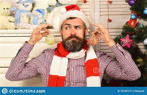 Santa Claus With Confused Face Near Christmas Tree On Background Stock