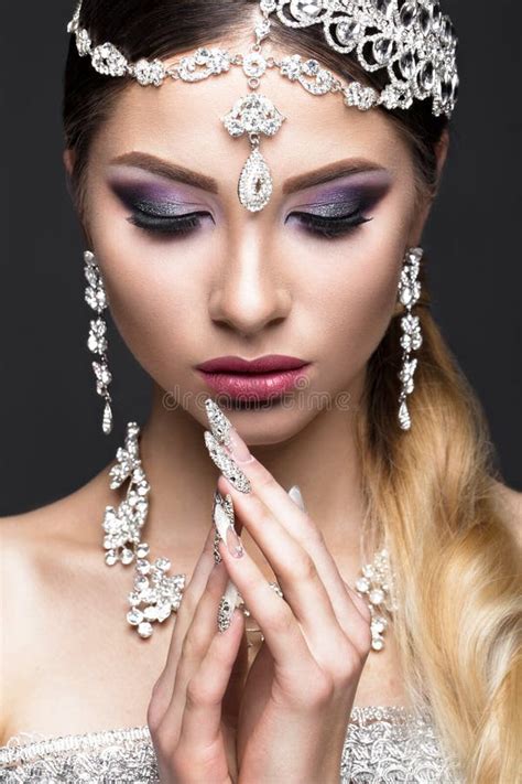 Beautiful Girl In Image Of Arab Bride With Expensive Jewelry Oriental Make Up And Bridal