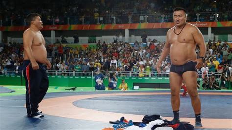 Bizarre Olympic Wrestling Match Ends With Coaches Stripping In Protest