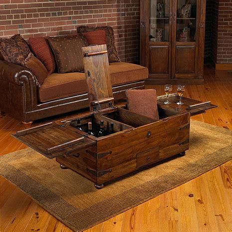 This coffee table leans into its coastal farmhouse look with natural wood finishes and a mixed material design. Thakat Bar Box Trunk Coffee Table - Wine Enthusiast