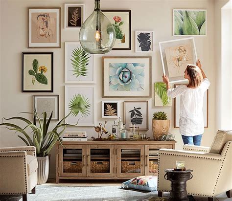 Gorgeous Gallery Wall Of Mixed Size Prints Over Media Console Gallery