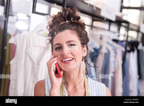 Enthusiastic Female Showroom Owner Responding Phone Call Stock Photo Alamy