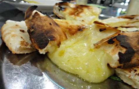 Form a well in the centre of the dry ingredients and add the oil and water. 5 Best Places For Cheese Naan In Klang Valley You ...