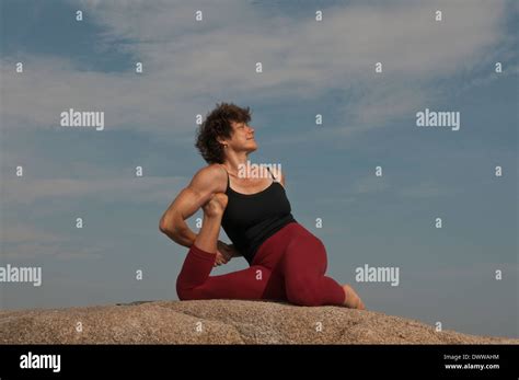 Iyengar Yoga Instructor Demonstrates Yoga Dandasana Sitting Stock