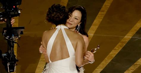 The Meaning Behind Halle Berry Presenting Michelle Yeoh With An Oscar
