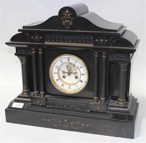 A Late 19th Century French Slate Mantel Clock With Eight Day Movement