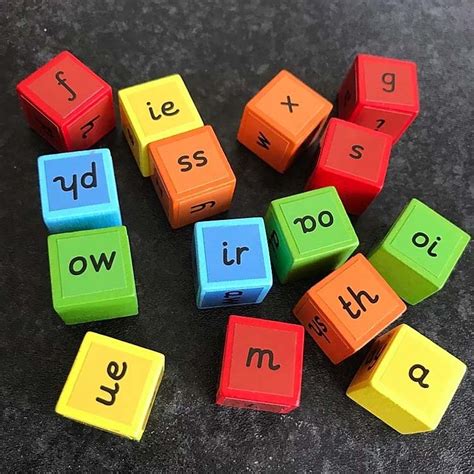 Phonics Dice Game Coloured Dice With Letters On Early Years