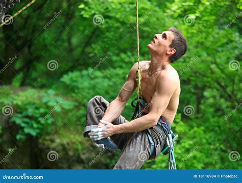 Tired Rock Climber Hanging On Rope Stock Images Image 18116984