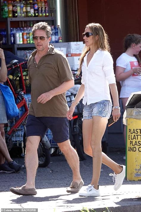 Hugh Grant Joins Leggy Wife Anna Eberstein For A Low Key Stroll During