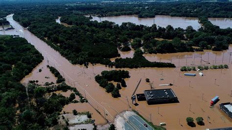 Photos Show Deadly Floods Destruction In Northeast Caused By Remnants