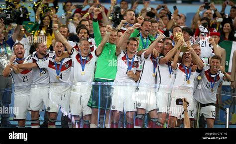 Germanys Philipp Lahm Lifts The World Cup Trophy As He Celebrates