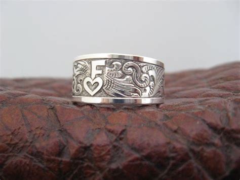 Travis stringer design | Western wedding rings, Engraved silver ring