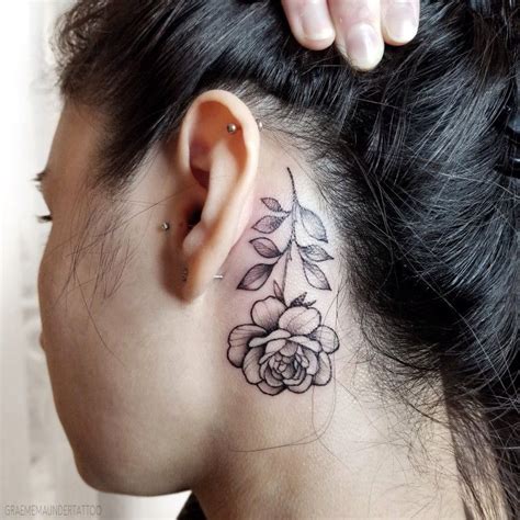 A Clean Single Stem Rose Tattoo Behind Her Ear This Little Black Rose