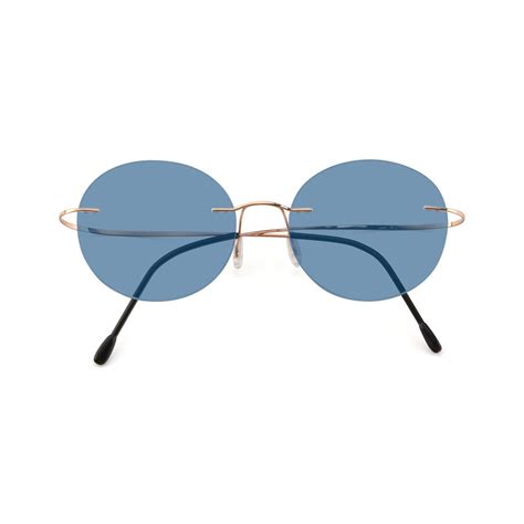 Rose Gold Flexible Round Rimless Tinted Sunglasses With Medium Blue Sunwear Lenses Leon