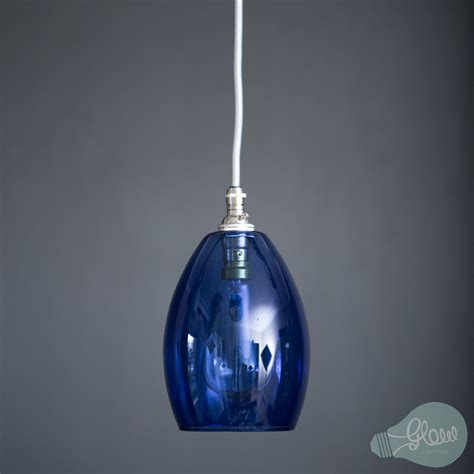 hand blown coloured glass pendant light our blue bertie is made in the uk by glow lighting