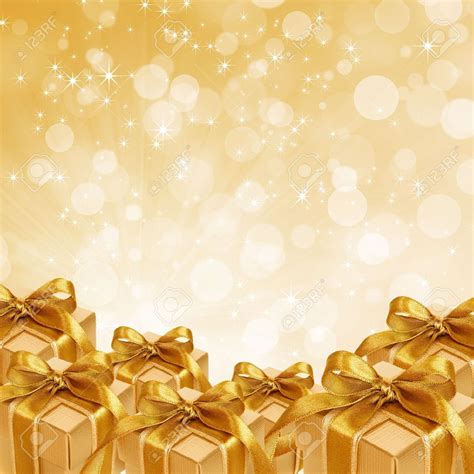 Gold T Box On Abstract Gold Christmas Background Stock Photo