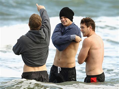 shirtless aussie rugby team takes a dip in the ocean hunks of the day tsm interactive