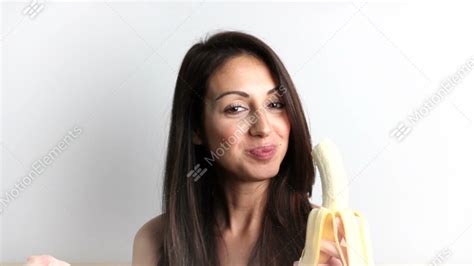 Young Woman Eating Banana Stock Video Footage 11040443
