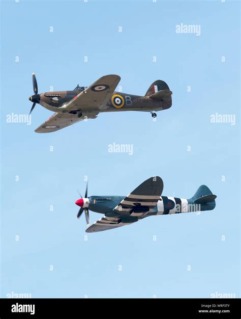 A Hurricane And Spitfire Flying As Part Of The Battle Of Britain