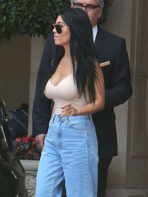 kourtney kardashian flashes major cleavage in plunging nude top mirror online