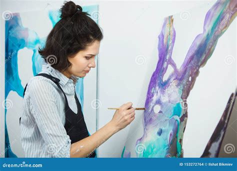 Concentrated Girl Focused On Creative Art Making Process In Art Therapy