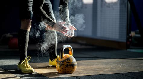 5 Crossfit Workouts You Can Do With Only A Kettlebell Muscle And Fitness