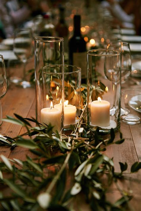Wedding Table Decoration With Olive Leaves Runner And Candles Tuscany