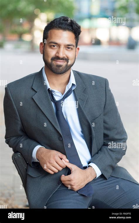 Indian Businessman Sitting On Bench In City Stock Photo Alamy