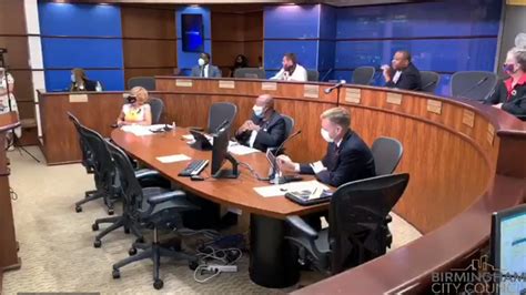 WATCH Birmingham City Council holds a meeting wears black ribbons