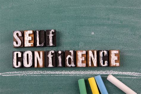 Self Confidence Wooden Letters On A Green Chalk Board Stock Photo