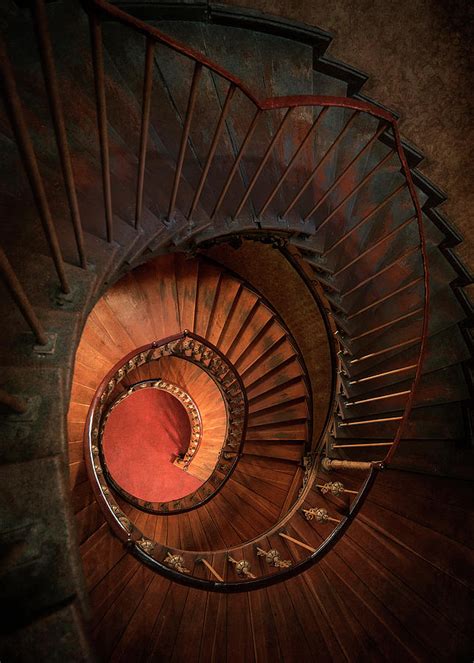 Recessed lighting to create interesting effects. Spiral Staircase In Red And Orange Colors Photograph by Jaroslaw Blaminsky