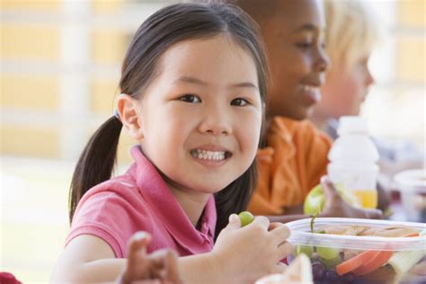 Kindergarten Children Eating Lunch — Stock Photo © Monkeybusiness 4759856