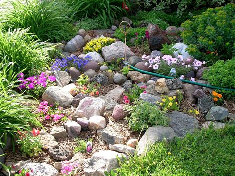 They can be found in different sizes and shapes and can be added in the garden in versatile ways. small rock garden ideas | rock garden | Home Landscaping ...