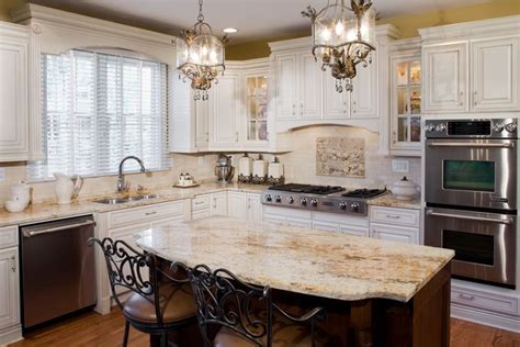 See all shop by project. Tuscan antique white kitchen cabinets, JennAir appliances ...
