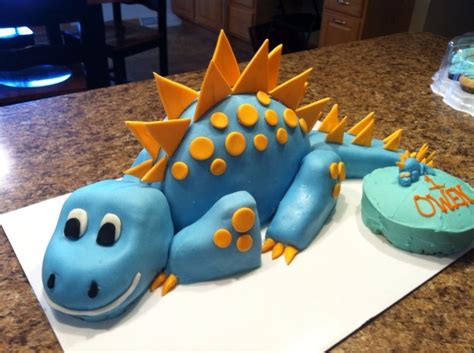 Get fun dinosaur party ideas for cakes, desserts, decorations, games, favors, and more. Image | Boys first birthday cake, Dinosaur birthday cakes ...
