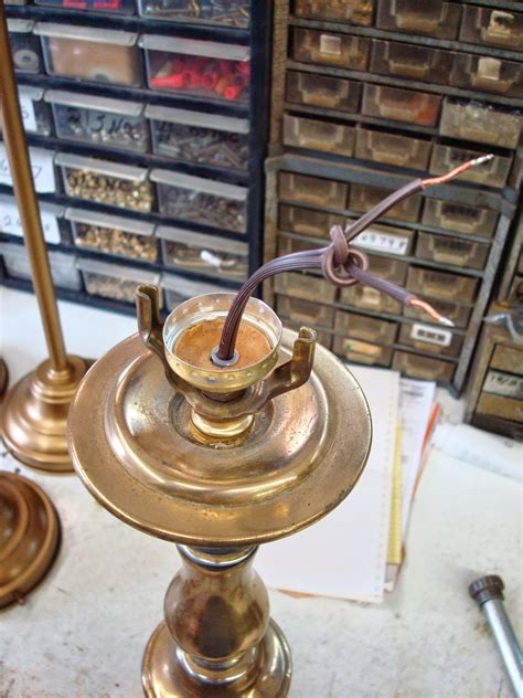 At its most basic form, a table lamp is a simple electrical circuit made of a bulb socket, a conductive cord, and a power plug. Lamp Parts and Repair | Lamp Doctor: Tighten Table Lamp Body