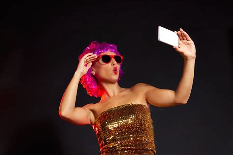 Shutterstock347262281 Crazy Purple Wig Girl Selfie Smartphone With Fun