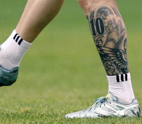 Lionel Messi appears to have coloured in his leg tattoo with a ...