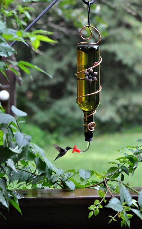 We saw some designs for plastic and wine bottles upcycled as bird feeders. Blue or Green Wine Bottle Hummingbird Feeder - The Viño ...