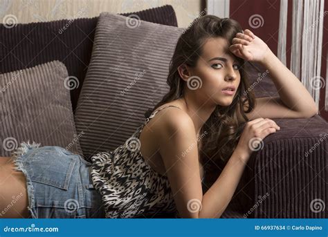Beautiful Woman Lying On Sofa Stock Photo Image Of Cute Denim