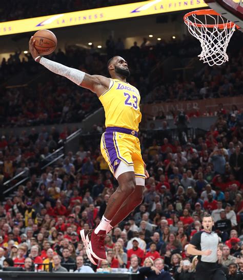 Today i share with you how to create this nba inspired wallpaper effect featuring quotes and pictures of lebron james. Lebron desktop wallpaper: Lebron James Dunk Like Kobe ...