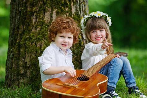 Cute Children Playing Guitar Stock Image Image Of Playing Pretty