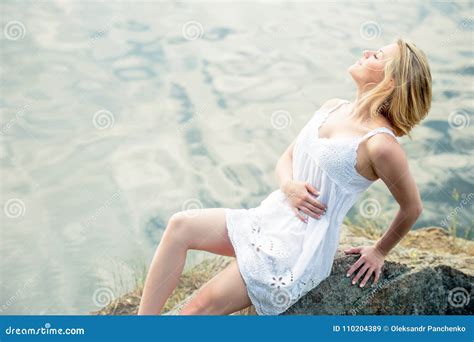 Young And Beautiful Woman Relaxing On The Beach Summer Time Re Stock