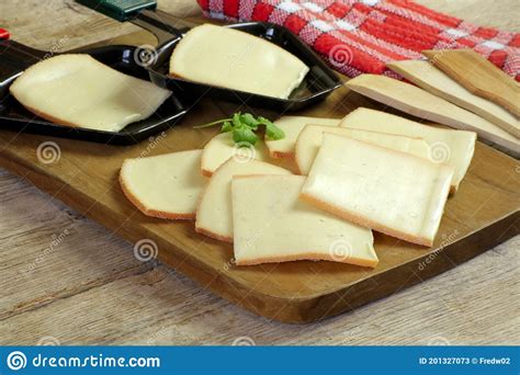 Raclette Cheese Slices And Cold Cuts Stock Image Image Of Board Cold