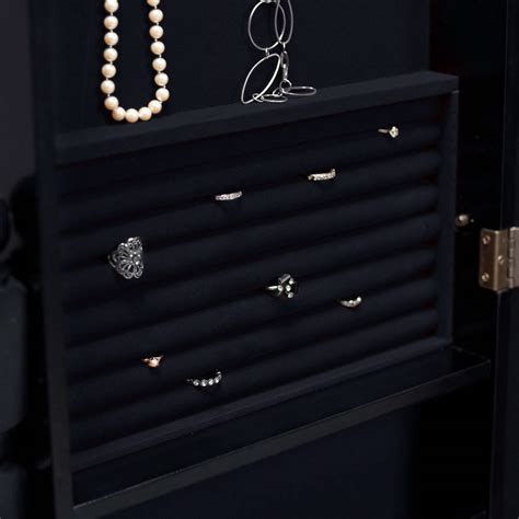 This prestigious full length free standing cheval mirror with crystal border is a bejeweled mirror and space saving jewelry organizer in one. Full Length Tilting Cheval Mirror Jewelry Armoire in Black ...