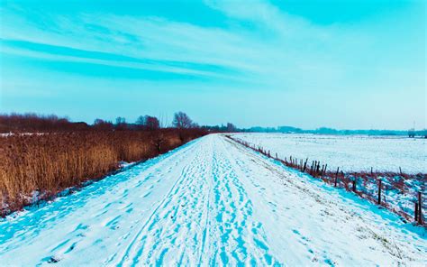 Download Wallpaper 3840x2400 Road Snow Traces Field Winter