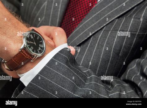 Man Wearing Wristwatch Stock Photo Alamy